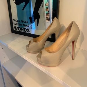 Authentic Peep-toe Christian Louboutin Pumps.